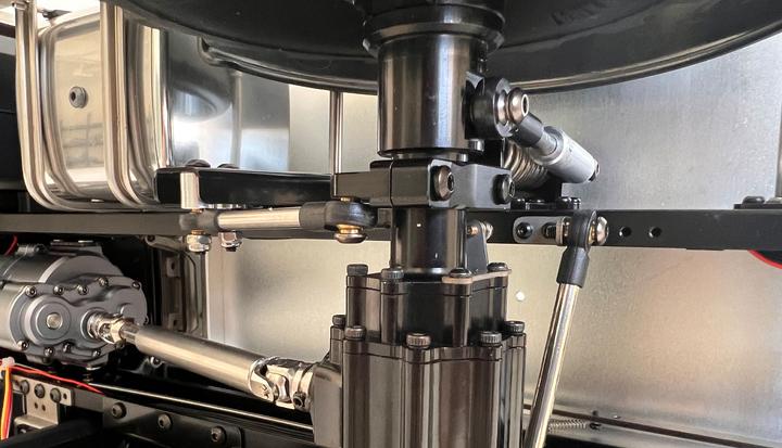 Immagine prodotto Amewi Mercedes-Benz Unimog, trasportatore di attrezzi 4WD (ARR Quasi lettura a corredo)