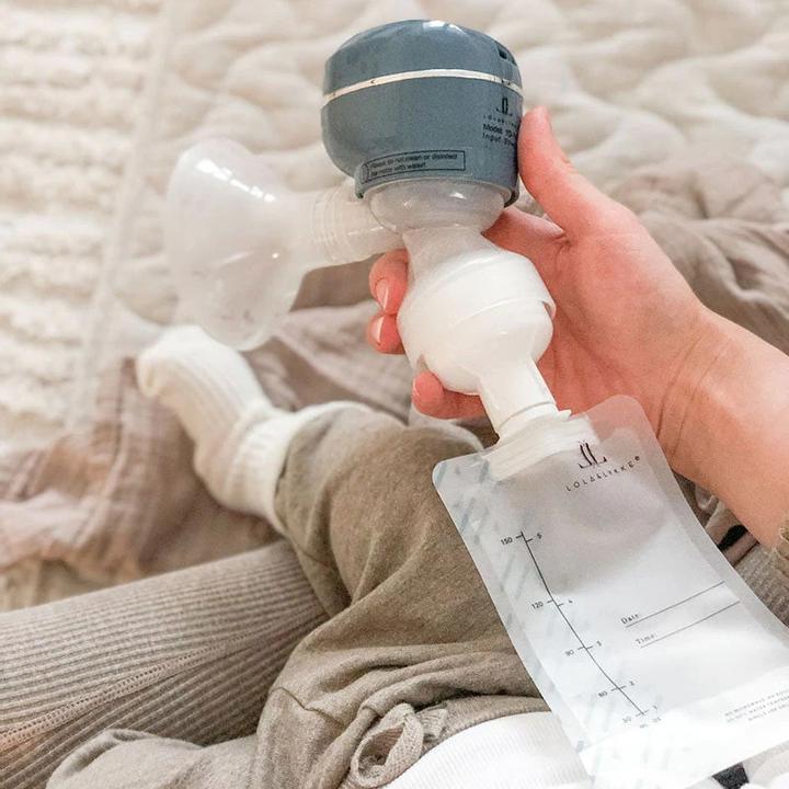 Produktbild Lola&Lykke Muttermilchbeutel und Adapter