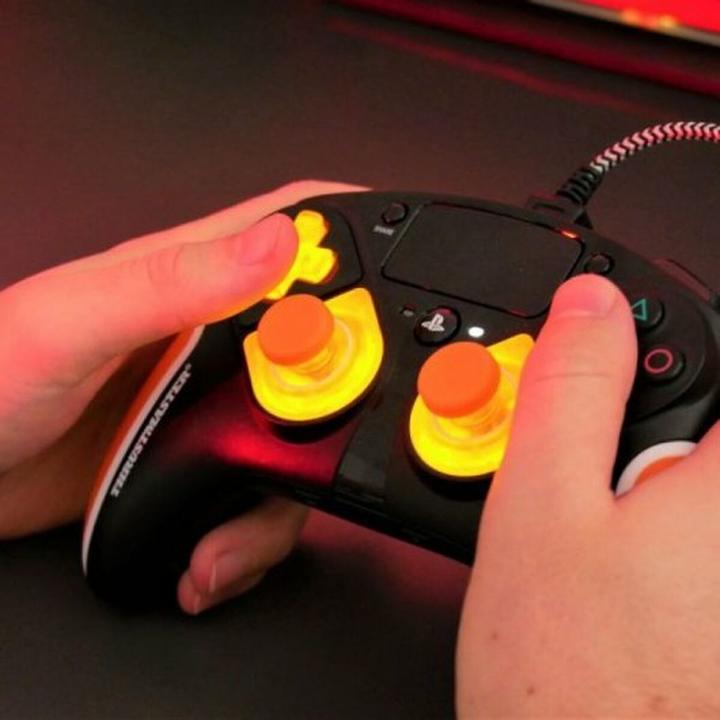 Actual product image Thrustmaster AddOn Gamepad Thrustm. eswap X LED ORANGE CRYSTAL P.XBO/PC (Xbox Series S, Xbox One S, PC, Xbox One X, Xbox Series X)