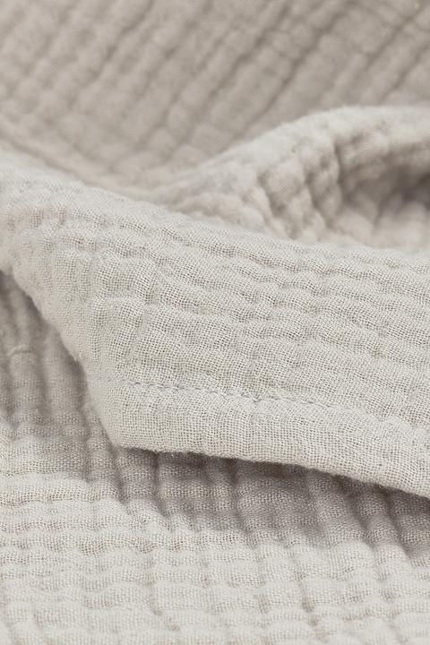 Actual product image Meyco Baby Uni cot sheet - pre-washed muslin - greige - 100x150cm