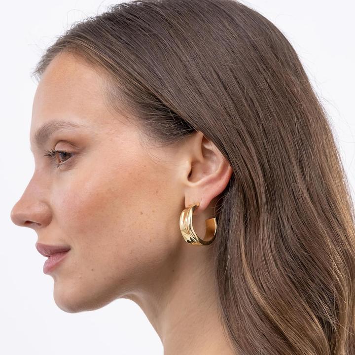 Immagine prodotto BOSS Orecchini con linee increspate e texture organica (Acciaio inossidabile, Giallo oro)