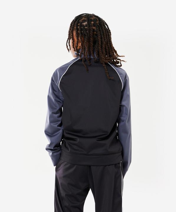 Produktbild Decathlon Trainingsanzug Kinder - 120 schwarz/weiss (122)