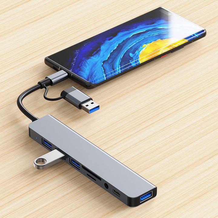 Immagine prodotto Deltalabs Hub multiporta USB C/USB 3.0 con SD/MicroSD e jack da 3,5 mm - 5 Gbit/s (USB C + 4x USB A) (USB-A, USB-C, 4 porte)