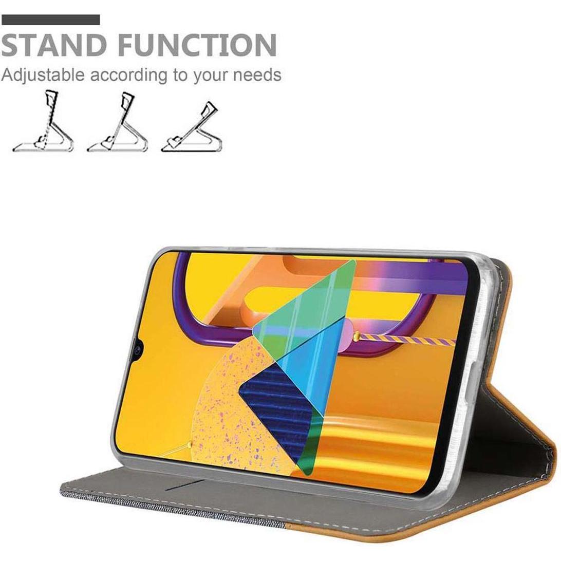 Thumbnail - Cadorabo Jeans Optik (Samsung Galaxy M21), Smartphone Hülle, Grau, Braun