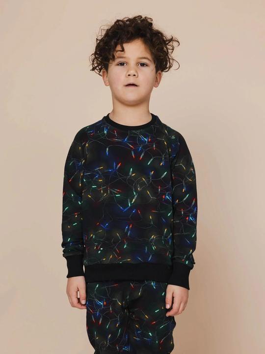Produktbild Snurk Kinderpullover Weihnachtslichter (104)