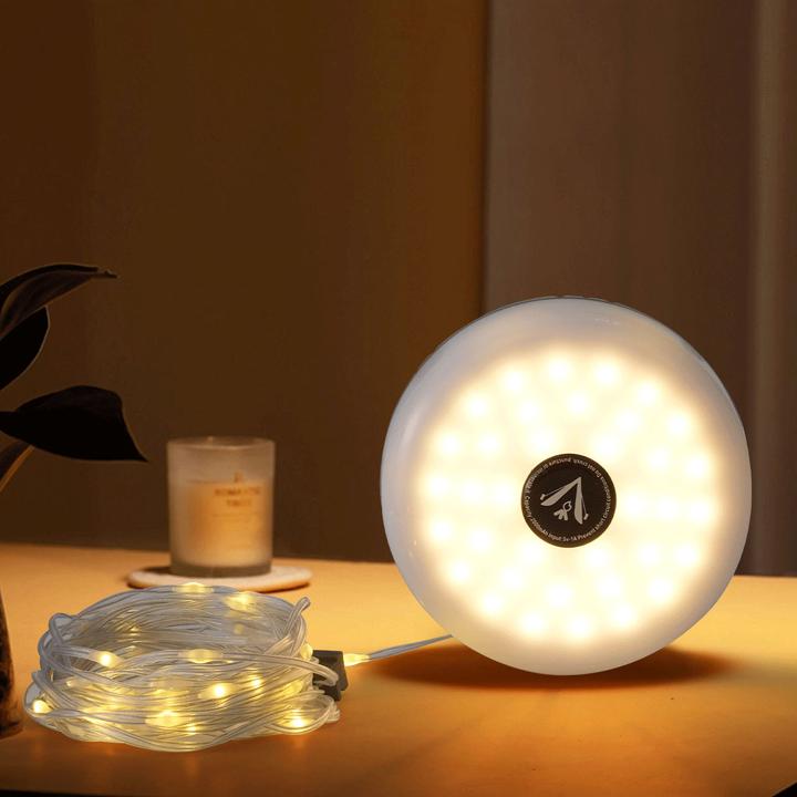 Comfort Aid 2in1 Campinglampe mit Lichterkette, 10m, aufrollbar, Akku, 5 Lichtmodi, IPX4