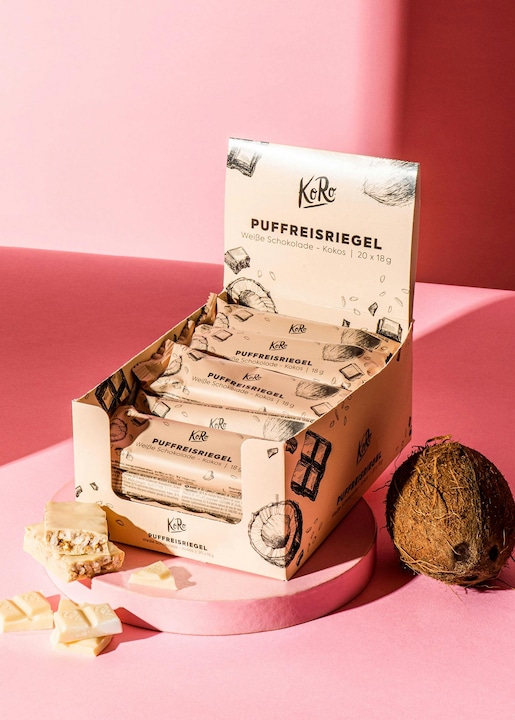 Produktbild KoRo Riegel aus braunem Vollkorneis überzogen mit weisser Schokolade mit Kokosnussaroma (360 g)