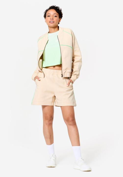 Produktbild Domyos Bomberjacke mit Reissverschluss Damen beige mit grün (M)