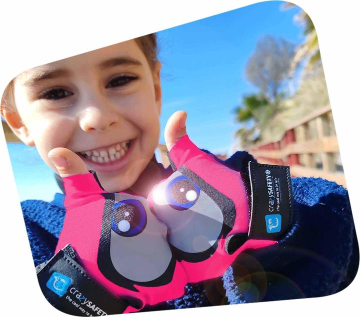 Actual product image Crazy Safety Pink kids bike gloves with reflective eyes, padded palms - Pink - Size S (S)