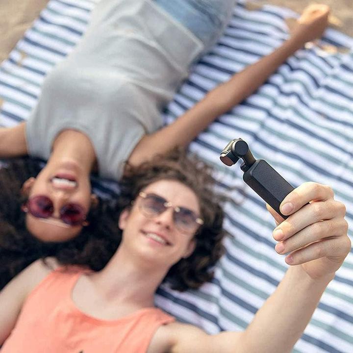 Produktbild DJI Osmo Pocket Prime Combo - 3-Achs-Gimbalstabilisator mit Zubehörkit und integrierter Kamera