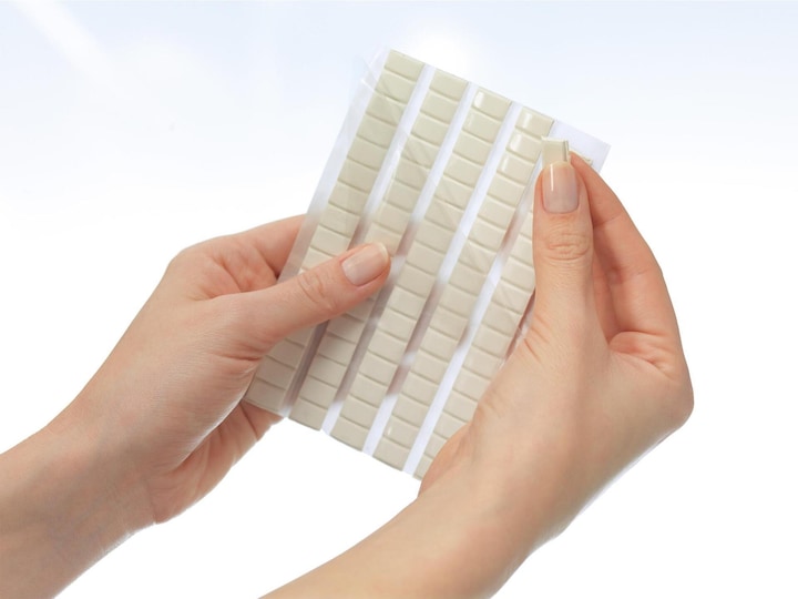 Actual product image tesa TACK adhesive putty, mouldable adhesive pads, 80 pieces (1 kg)