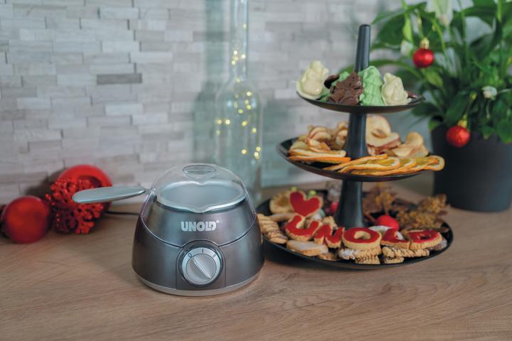 Produktbild Unold Chocolatier Weihnachtsedition 48967 (braun/silber, 25 Watt, 12 weihnachtliche Förmchen) (Schokoladenfondue)
