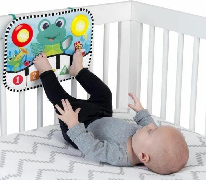 Immagine prodotto Baby Einstein Cuscino musicale e giocattolo da culla, Neptune's Kick & Explore™. (Inglese, Francese, Spagnolo)