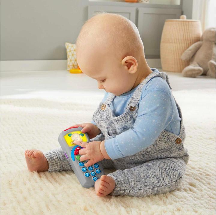 Actual product image Fisher-Price Learning fun doggie remote control educational toy for babies and toddlers with music and lights (German, 0.50 - 3 years)