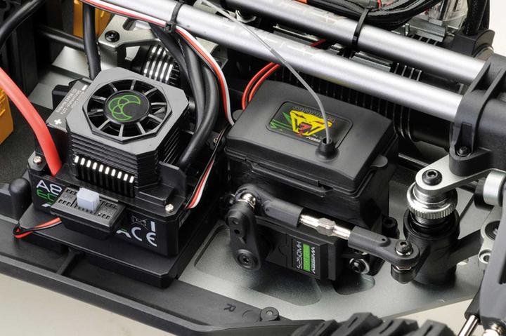 Actual product image Absima rock racer "mamba 7" orange 1/7 6s bl rtr incl. 2pcs. 6200mah 11.1v lipo batteries (4140031) (RTR Ready-to-Run)