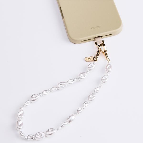 Actual product image Uniq Coehl Perla Handstrap uniwersalny sznurek do telefonu na rękę biały/white pearl