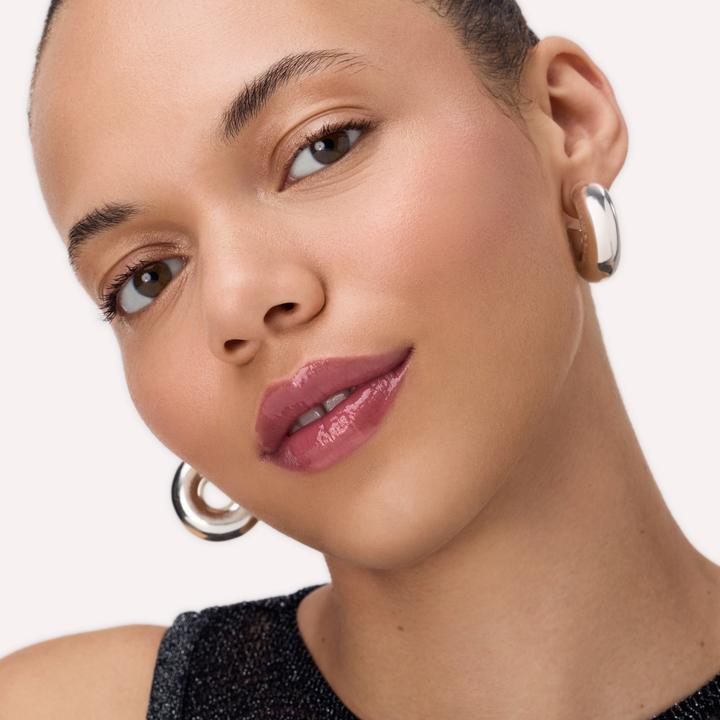 Actual product image Catrice Peptide Bliss Glossy Lip Balm (#8F403F)