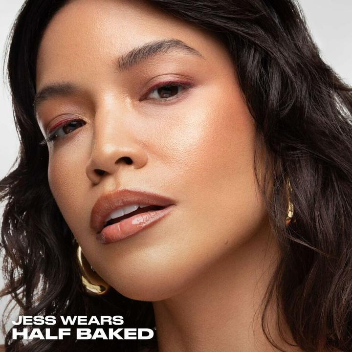 Actual product image Urban Decay Face Bond Luminizer Half Baked Warm Bronze Gold All-Over Liquid (Warm Bronze Gold, Highlighter)