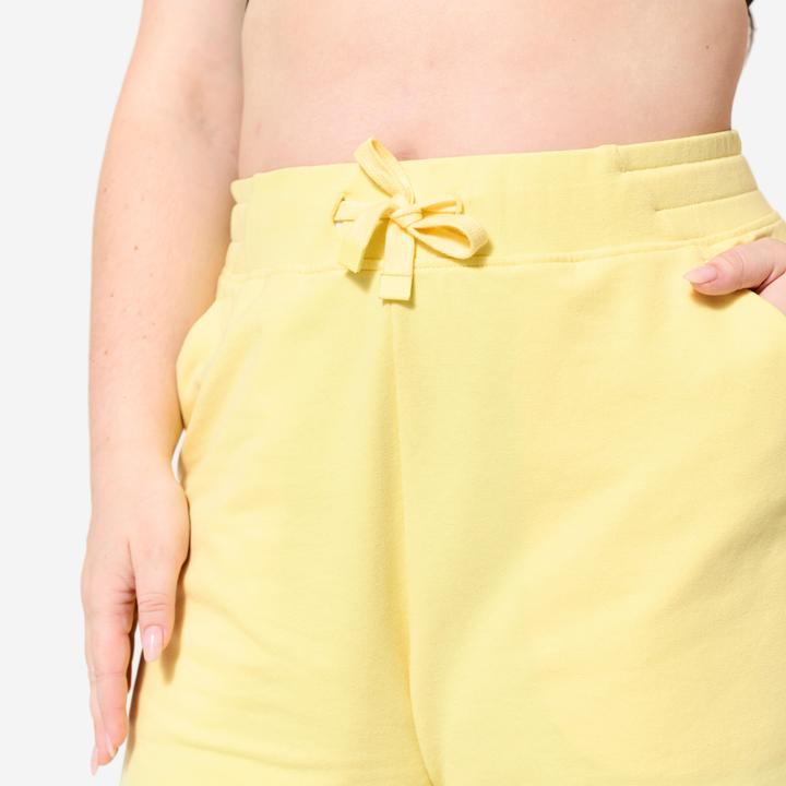 Produktbild Domyos Shorts Damen mit Tasche - pastellgelb (M)