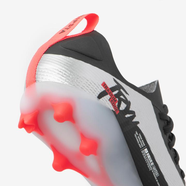 Immagine prodotto Kipsta Scarpe da calcio cam da donna/uomo AG/FG - Traxium Edge Alluminio arancione (41)
