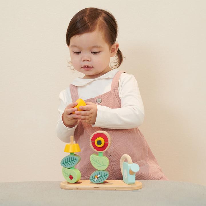 Immagine prodotto Classic World Puzzle di legno impilabile giardino fiorito, 11 pezzi.