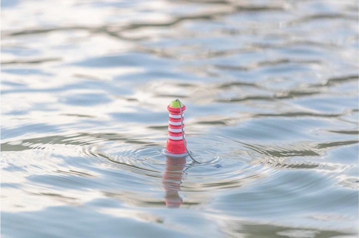Actual product image Trixie Floating toy Aqua Toy Lighthouse 20 cm, orange, grey (Dog chew toy)