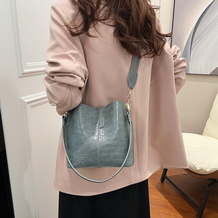 Immagine prodotto Only-Bags.Store Borsa a secchiello con motivo a coccodrillo - Versatile borsa a tracolla e crossbody, repellente