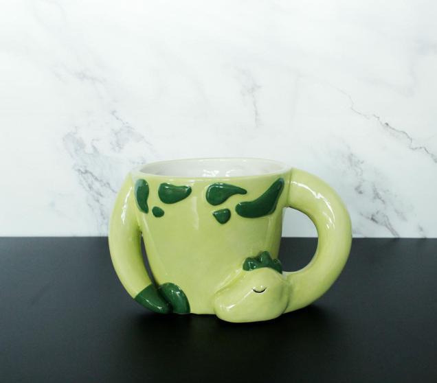 Immagine prodotto Winkee - Sleeping Dino Mug - Light Green (350 ml, 1 x)